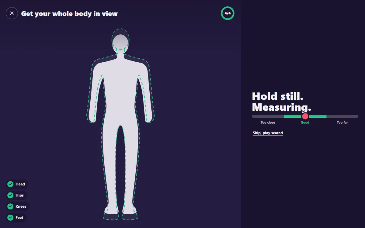 The camera check of BodyArcade: a light body outline on a dark screen with dashed edges, a list of Head, Hips, Knees and Feet with green ticks, and a bar that says Hold still. Measuring.